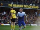 James McClean heads Latics level off the underside of the bar