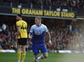 James McClean heads Latics level off the underside of the bar