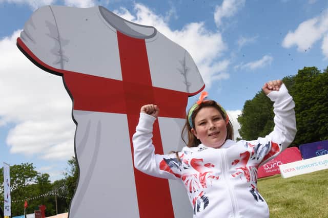 Naomi Parr, 12, shows her support for the England team.