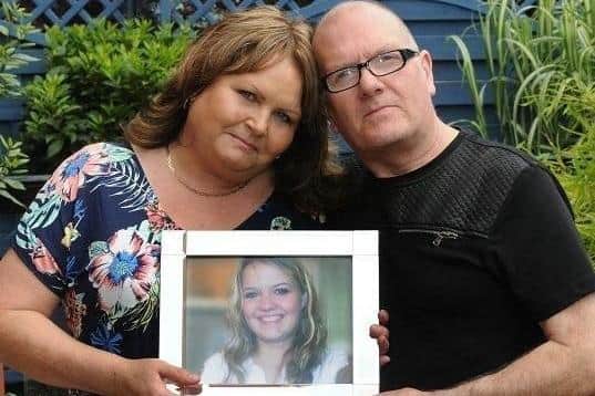 Sheila and Trevor Fairhurst with a picture of their beloved daughter Carly 