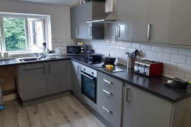 The recently refurbished kitchen in the upstairs living quarters