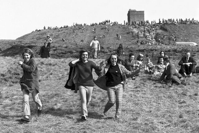 Wiganers join the crowds for the traditional gatherings at Rivington Pike during the Easter holidays in 1968.