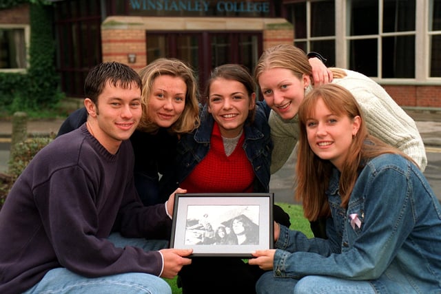 Pupils at Winstanley college with the photograph from the Verve, Pictured left to right are; Gareth Griffiths, Louise Niblock, Alison McAdam, Louise Shaw and Sarah Schofield