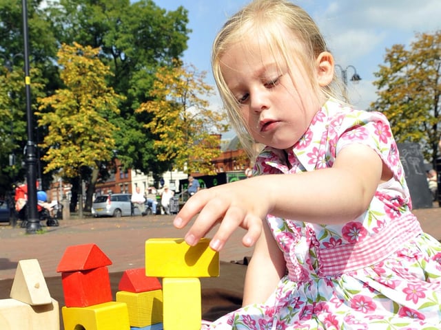 Children play with Victorian toys in Civic Square, Leigh as part of the Leigh celebration weekend. Pictured is Caitlin