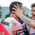 John Bateman celebrates with Jake Wardle at full time