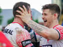 John Bateman celebrates with Jake Wardle at full time