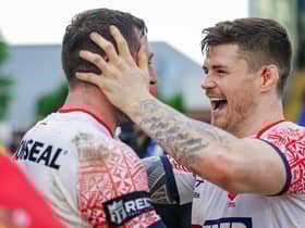 John Bateman celebrates with Jake Wardle at full time