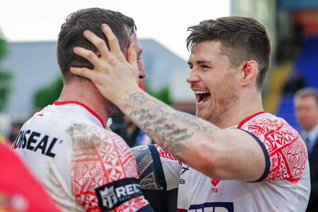 John Bateman celebrates with Jake Wardle at full time