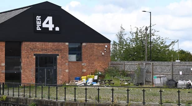 The buildings at the Wigan Pier development. Much work has been done but since it stalled the weeds have started to take over