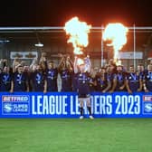 Wigan Warriors celebrate winning the League Leaders' Shield