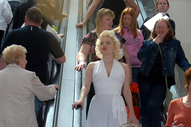 RETRO 2007  - Opening of the Grand Arcade Wigan
Shoppers at the Grand Arcade share the stairs with Marylin Monroe.