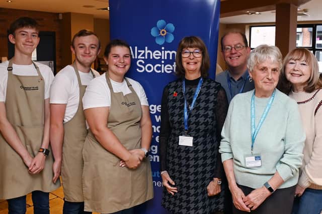 Pauline Blackie, dementia advisor and dementia café co-ordinator for the Alzheimer’s Society in Wigan Borough.  Summat to Ate staff members, Alzheimer's Society staff and volunteers at the event.