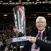 Outgoing Wigan chairman Ian Lenagan with the Betfred Super League tropy after his side's victory over Catalans