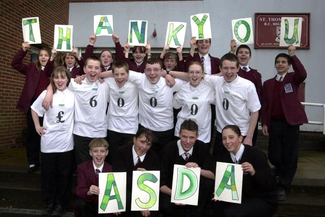 2003 - Pupils from St Thomas More RC High School thank ASDA for a donation to the school.