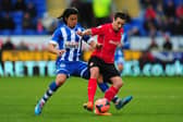 Don Cowie in action for Cardiff against Latics in February 2014, prior to his move to Wigan at the end of the campaign