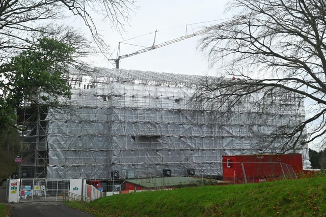 Scaffolding surrounding Haigh Hall is removed, part of the Haigh Hall project.
