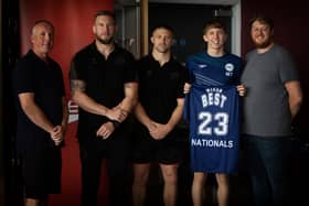 Mike Cooper and Ryan Hampshire presented shirts to the Wigan BEST squad