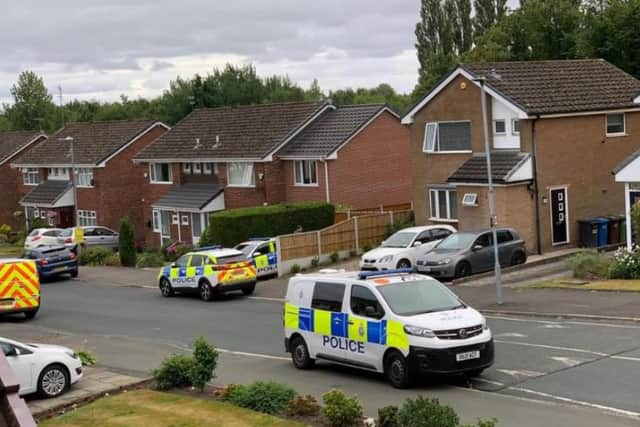 A significant police presence on Walter Scott Avenue, Whitley