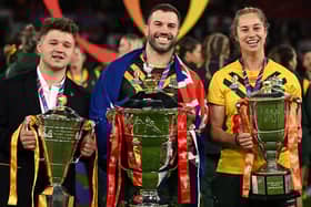 All three captains with their team's trophies (Photo by OLI SCARFF/AFP via Getty Images).