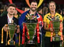 All three captains with their team's trophies (Photo by OLI SCARFF/AFP via Getty Images).
