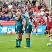 Harry Smith with Liam Marshall during the victory over Salford Red Devils