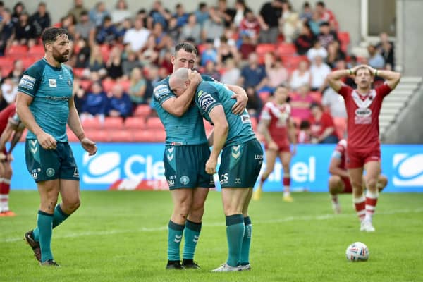 Harry Smith with Liam Marshall during the victory over Salford Red Devils