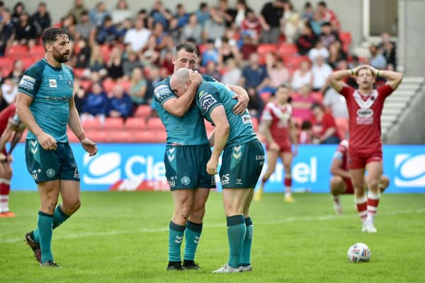 Harry Smith with Liam Marshall during the victory over Salford Red Devils