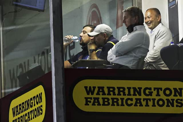 Former England Rugby Union coach Eddie Jones with ex-Warrington boss Steve Pryce during Warrington Wolves v St Helens in 2021