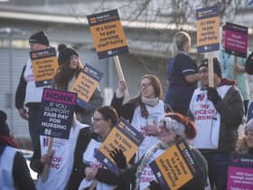 A Royal College of Nursing picket line as staff strike outside a hospital.