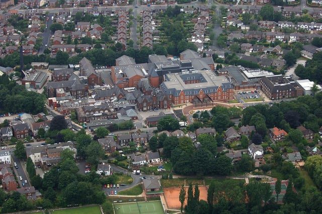 WIGAN AERIAL PICTURES - Wigan Infirmary, Wigan Lane, with Swinley behind, including Mesnes Road across the top. At the bottom are Bellingham Tennis Club and Bellingham Bowling Club.
