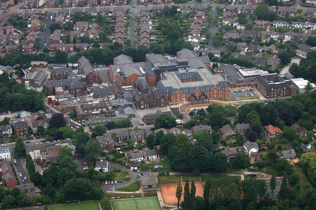 WIGAN AERIAL PICTURES - Wigan Infirmary, Wigan Lane, with Swinley behind, including Mesnes Road across the top.  At the bottom are Bellingham Tennis Club and Bellingham Bowling Club.