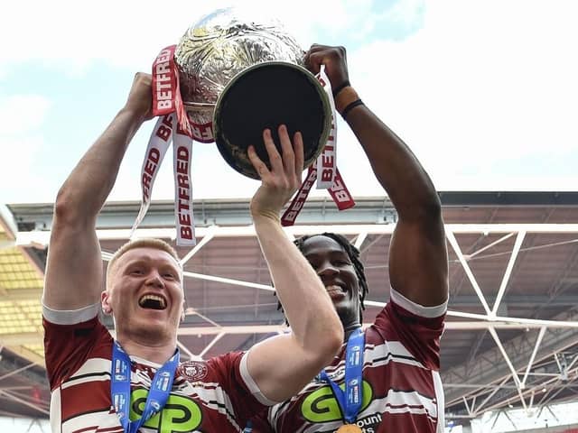 Zach Eckerseley raises the Challenge Cup with fellow Academy graduate Junior Nsemba