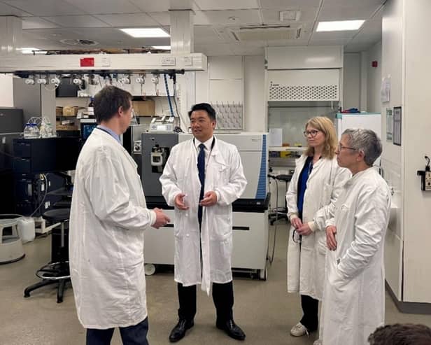 Professor Anthony Green (left), Alan Mak MP (centre, left), Professor Aline Miller (centre, right) and Dr Rosalind Le Feuvre (right) in one of the laboratories inside the Manchester Institute of Biotechnology