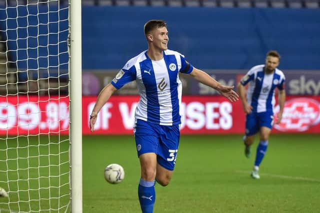 Adam Long celebrates scoring his first senior goal against Shrewsbury