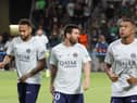 Lionel Messi, with PSG team-mates Neymar (left) and Kylian Mbappe (right)