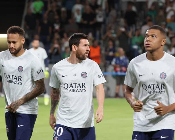 Lionel Messi, with PSG team-mates Neymar (left) and Kylian Mbappe (right)