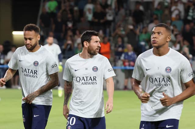 Lionel Messi, with PSG team-mates Neymar (left) and Kylian Mbappe (right)