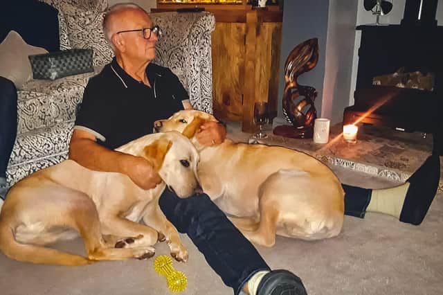 Bill Culshaw with the guide dogs.
