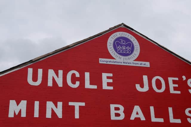 The Uncle Joe's Mint Ball sign on the side of William Santus & Co Ltd building