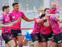The Warriors celebrate their win at Belle Vue last year