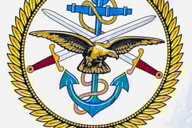 The front of the blanket bears the combined insignia of the armed forces and reservists