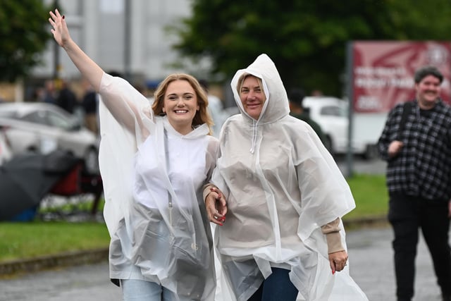Music fans ready for the rain.