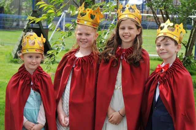 Pupils a Abram St John's Primary School, have a day of celebration for the Queen's platinum jubilee, dressed up in the colours of the union flag, each classroom had a queen for the day, they had a street party in the playground and games on the lawn.