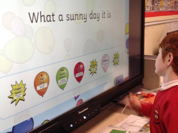 Aspull Holy Family Catholic Primary School's creative video entry has earned them a state-of-the-art interactive display.