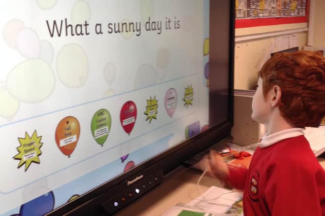 Aspull Holy Family Catholic Primary School's creative video entry has earned them a state-of-the-art interactive display.