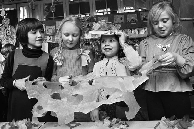 Making Easter bonnets are Jane Capstick, Lyn Berry, Sharon Walsh and Carol Johnson at Britannia Bridge CE Primary School, Lower Ince, in March 1976.  