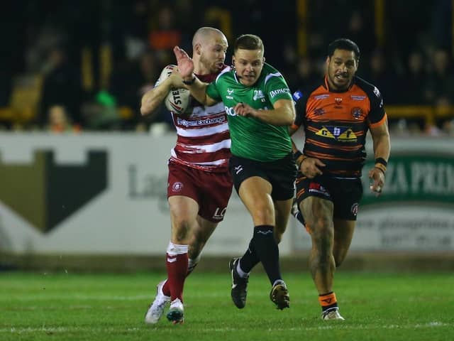 Liam Marshal is blocked by the referee