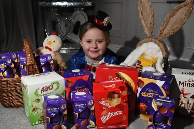 Lavana Davies, four, from Ince, is hoping to collect 100 chocolate eggs to donate to residents of a local care home and for children in the Rainbow Ward at Wigan Infirmary at Easter. She's wearing her favourite Mary Poppins costume that she also recently sported at World Book Day