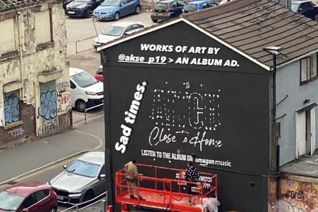 The mural was painted over to promote Aitch's new album