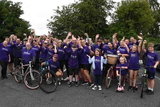 Fund-raisers get on their bikes for the annual Olly's Army bike ride from Southport to Abram
